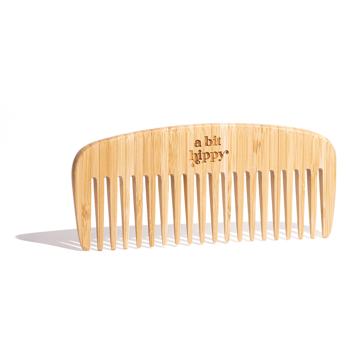 Wide tooth bamboo comb by A bit Hippy, eco friendly and sustainable hair care accessory plastic free