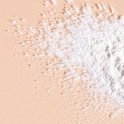  A bit Hippy anti-irritation dry shampoo powder spread across peach background, irritation and alcohol free hair washing alternative. 