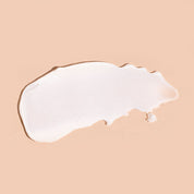A bit Hippy Face Cream swatch on peach background, ultra hydrating moisturiser with Hyaluronic Acid and Vitamin C to reduce wrinkles and hydrate skin.