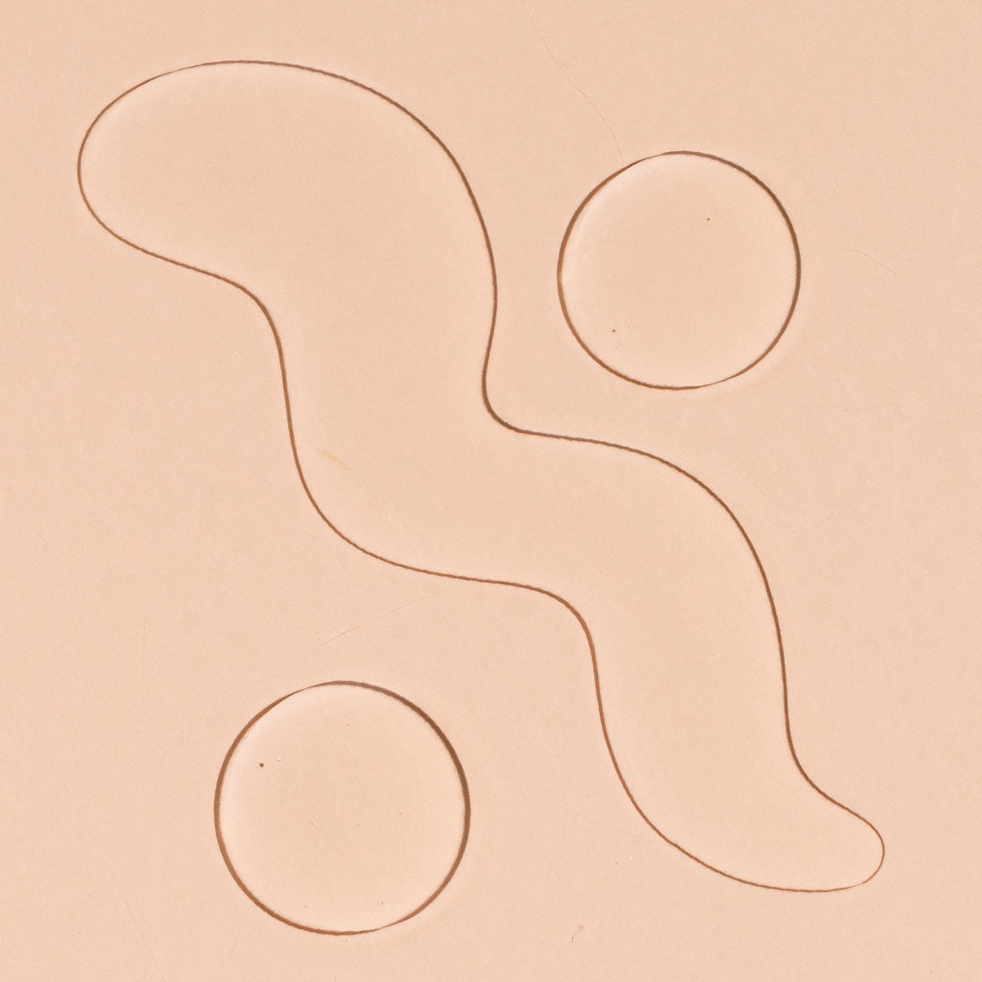 A bit Hippy Oil Cleanser swatch on peach background, Jojoba, Grapeseed and Rice Bran Oil formula to cleanse makeup and excess sebum.