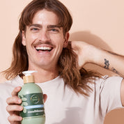 A bit Hippy Anti-Dandruff Conditioner lifestyle photo with man, gentle plant-based formula for dandruff relief