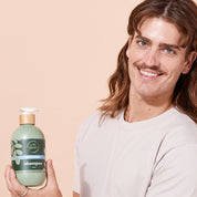 A bit Hippy Anti-Dandruff Shampoo lifestyle photo with man, gentle plant-based formula for dandruff relief