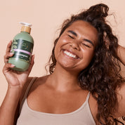 A bit Hippy Anti-Frizz Shampoo lifestyle photo with model, vegan shampoo for frizz control and hydration